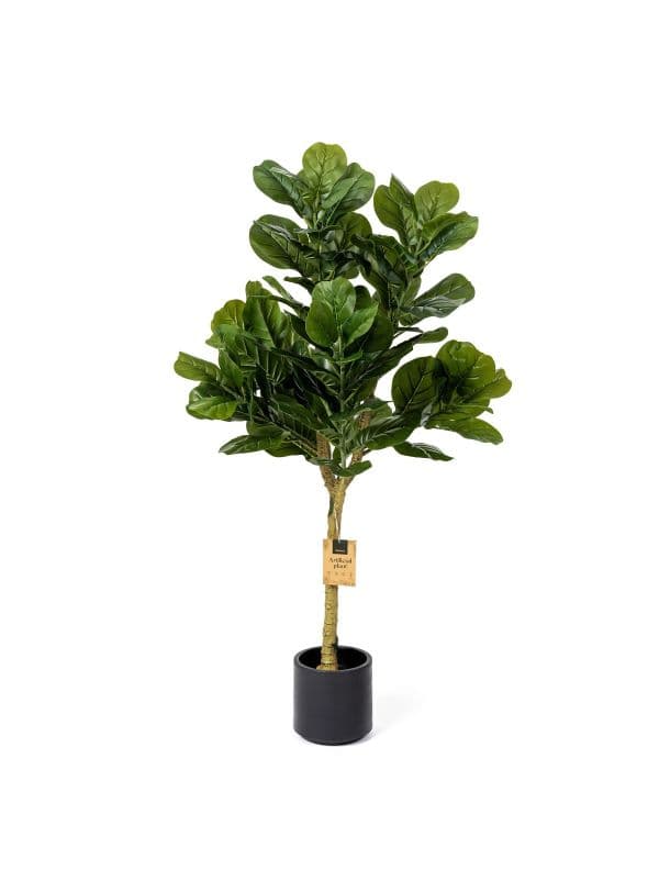Sztuczny fikus dębolistny 130 cm FairyTrees o dużych, matowych, zielonych liściach na jasnym tle.
