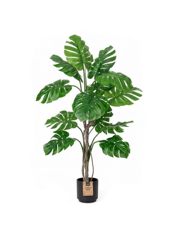 Sztuczna monstera na pniu 160 cm FairyTrees na białym tle, z dużymi, zielonymi liśćmi z charakterystycznymi wycięciami. 